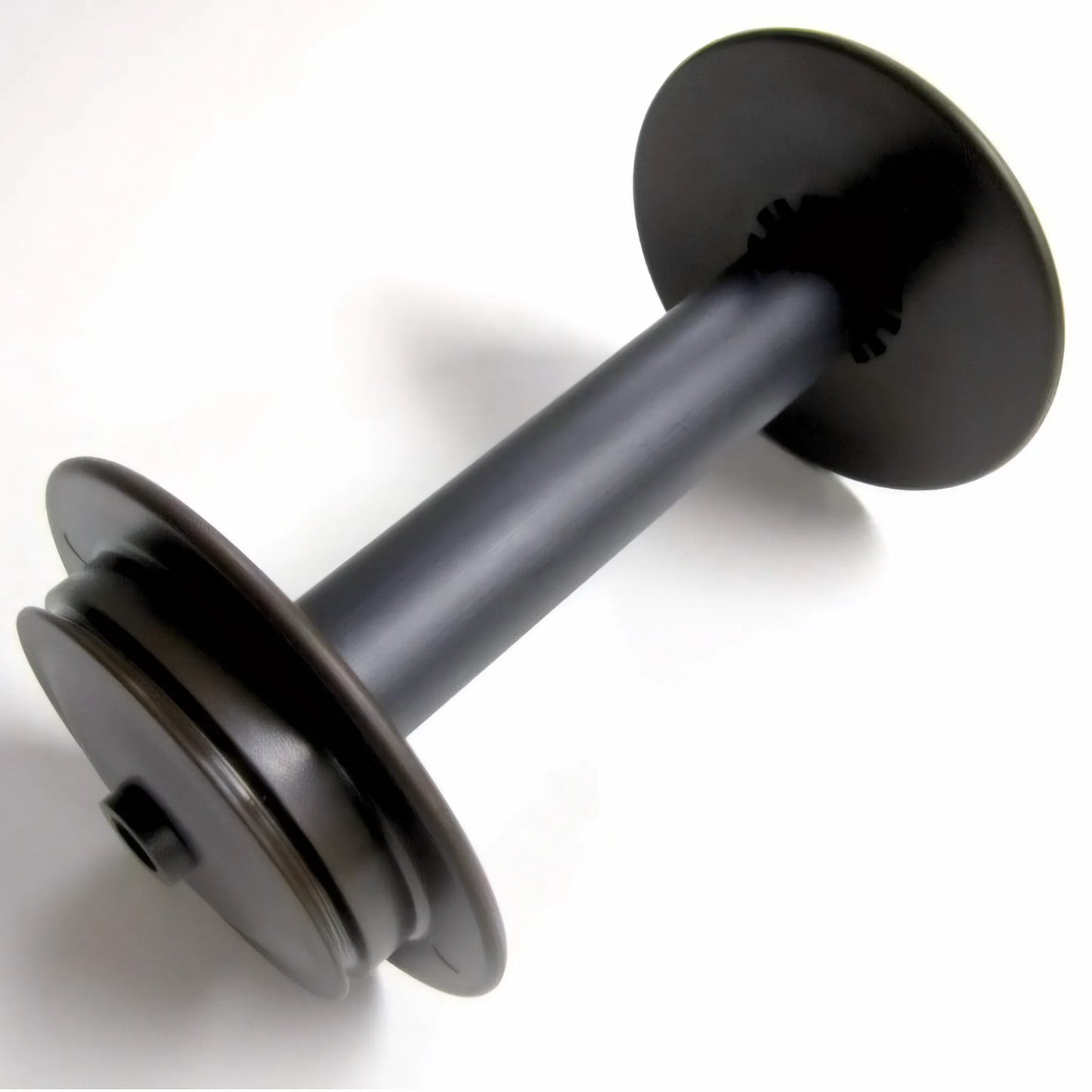 Schacht Travel Spinning Wheel Bobbin made of plastic shown against a white background, shows black plastic core and slightly browner whorls