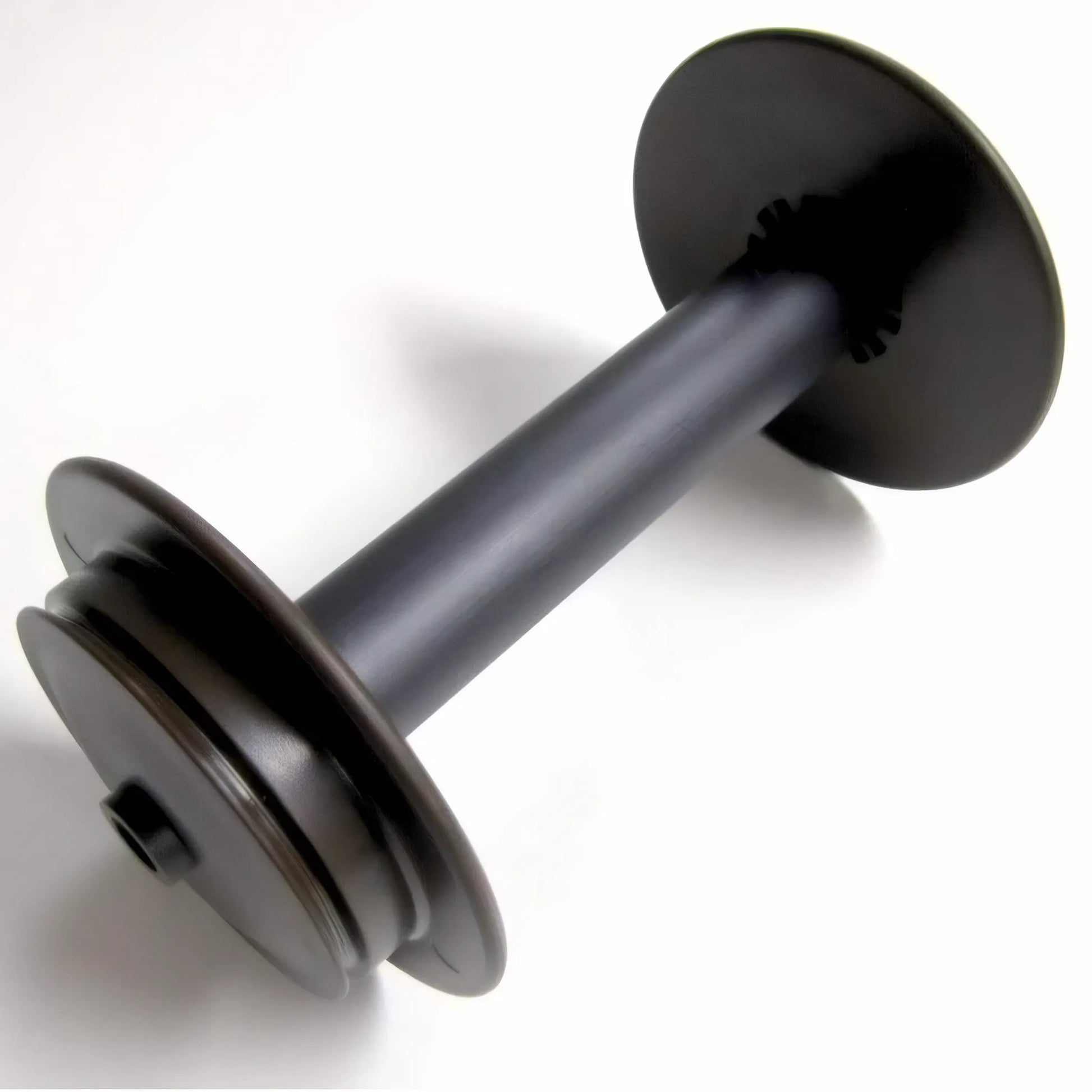 Schacht Travel Spinning Wheel Bobbin made of plastic shown against a white background, shows black plastic core and slightly browner whorls