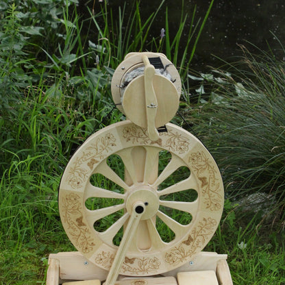 SpinOlution Monarch Butterfly and Wildflowers engraving on a Monarch spinning wheel