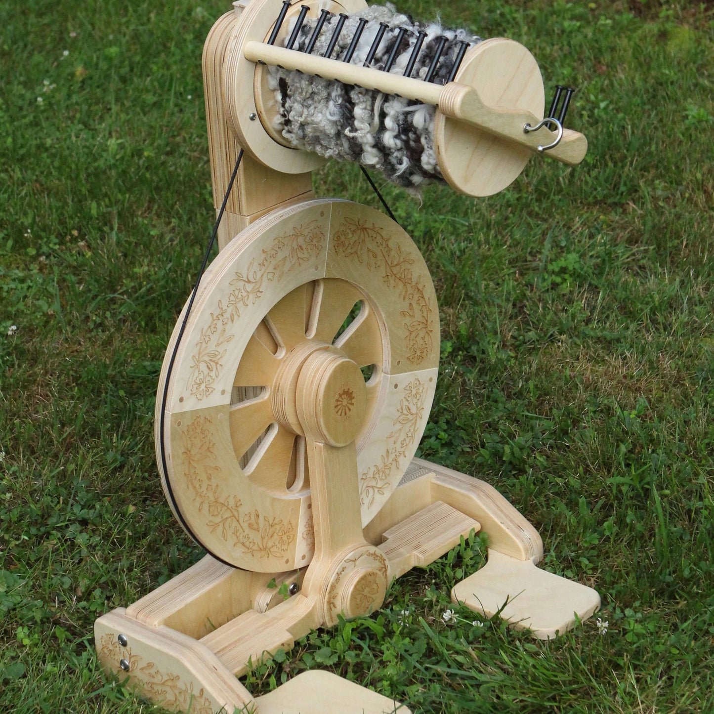 SpinOlution Wildflowers engraving on an Echo spinning wheel