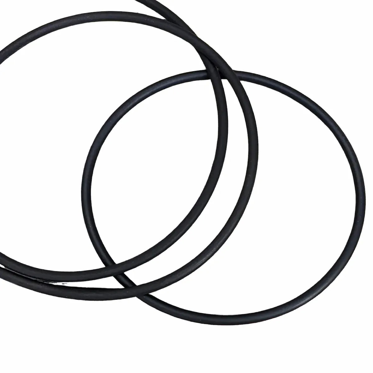Three black rubber drive bands on a white background