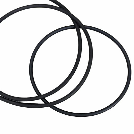 Three black rubber drive bands on a white background