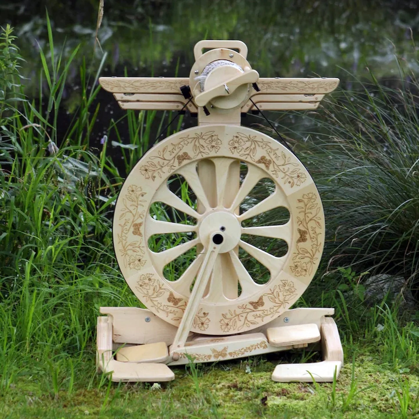 SpinOlution Lazy Kate attached to Monarch spinning wheel