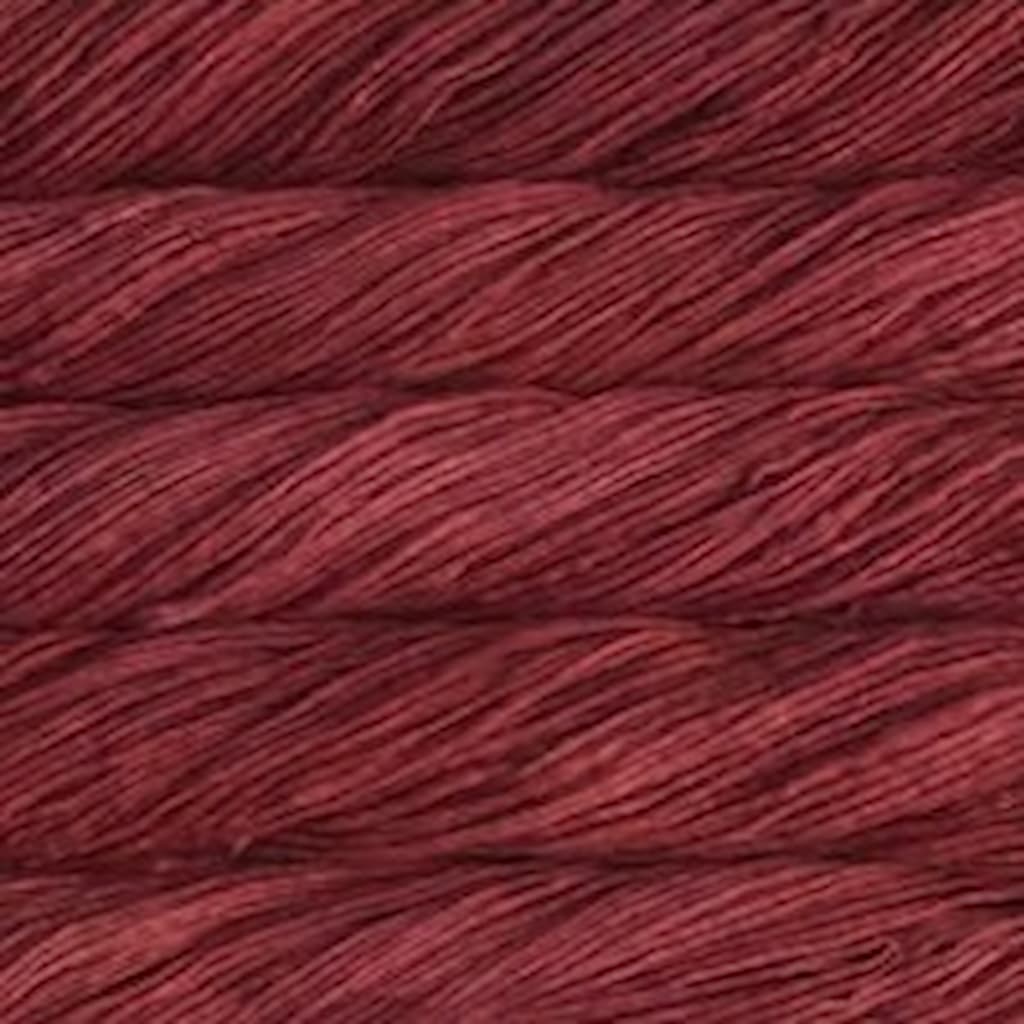 Close-up of burgundy yarn.