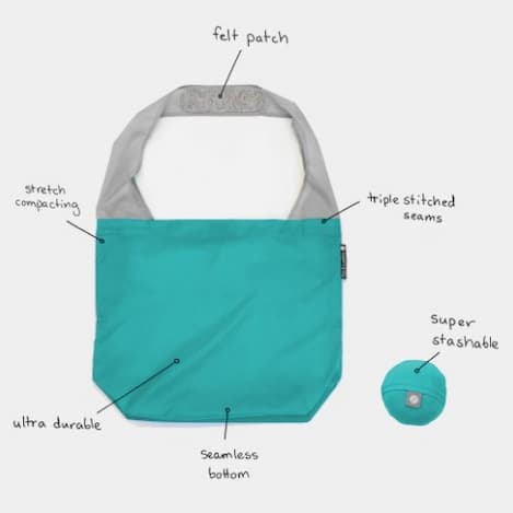 Flip and Tumble tote in peacock color with descriptive notes. 