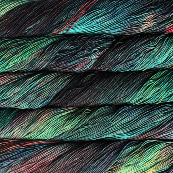 Malabrigo Sock Yarn in Cameleon - a variegated colorway in red, green and teal