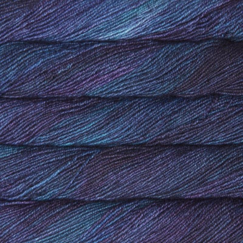 Malabrigo Dos Tierras DK Yarn in Whales Road 247- a variegated blue and indigo colorway