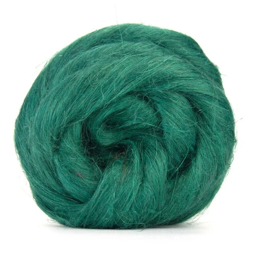 Color Avocado. A dark green shade of dyed Flax fiber spinning top.