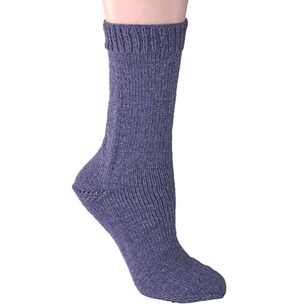 Color Denim 17172. A solid color Blue skein of Berroco Comfort wool-free sock yarn.