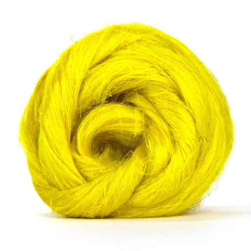 Color Canary. A bright yellow shade of dyed Flax fiber spinning top.