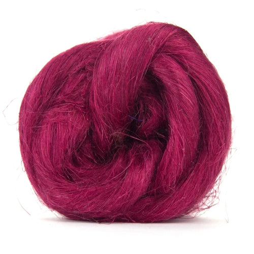 Color Carmine. A dark muted pink shade of dyed Flax fiber spinning top.