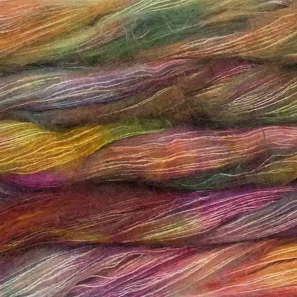 Color: Diana 886.  An orange, pink, and green multicolored color of Malabrigo Mohair yarn.