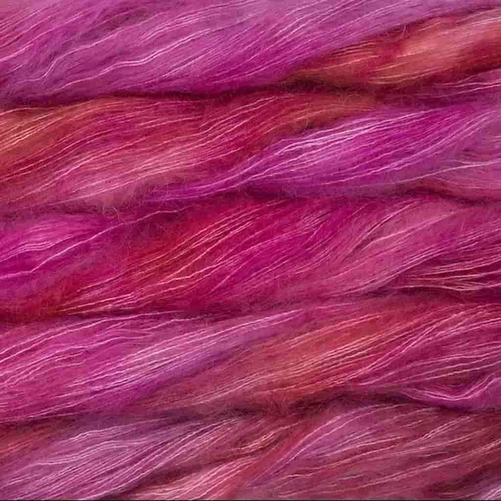 Color: English Rose 057. A bright pink color of Malabrigo Mohair yarn.