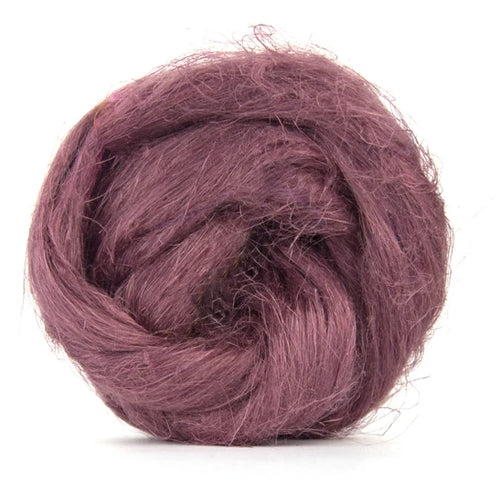 Color Grape. A dark muted purple shade of dyed Flax fiber spinning top.