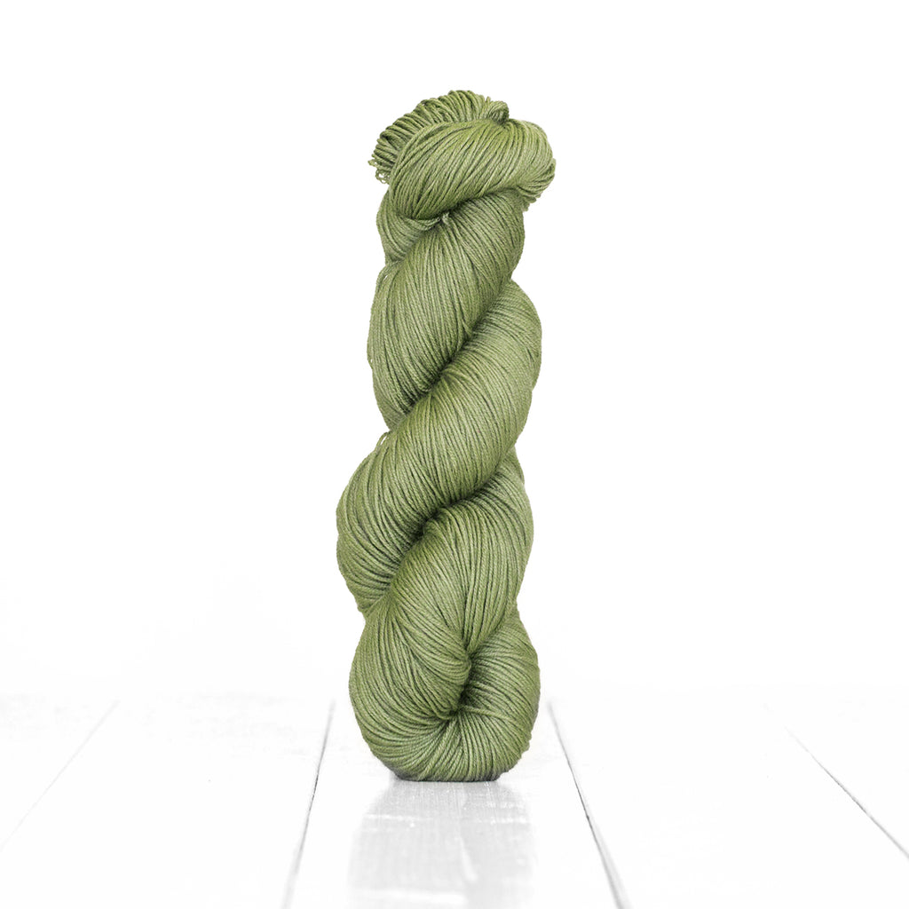 Color Grape Leaf, hand-dyed skein of yarn, celadon color produced from natural grape leaf.