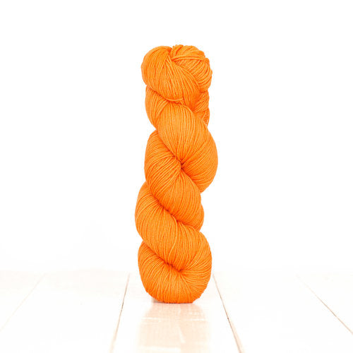 Knit a tie with Harvest Fingering yarn, hand-dyed with Oranges.