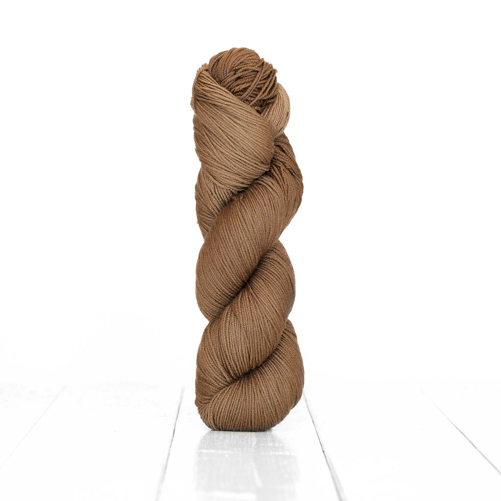 Color Walnut, hand-dyed skein of yarn, light cool brown color produced from natural walnuts.