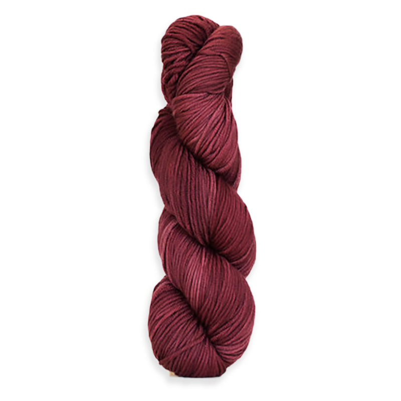 A twisted hank of Harvest Worsted hand-dyed burgundy with Black Grapes.