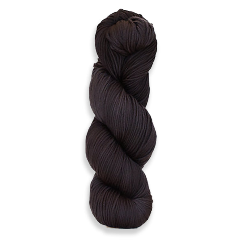 A twisted hank of Harvest Worsted hand-dyed black with Thuja.