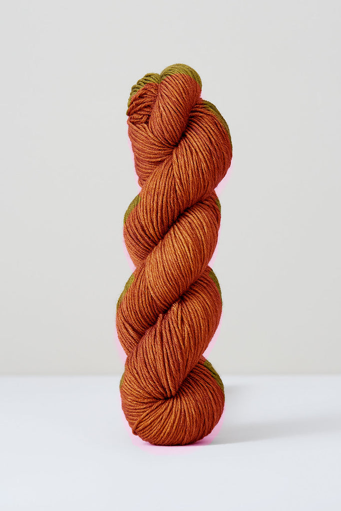 Color Cinnamon, hand-dyed skein of yarn, in a warm brown color naturally dyed with cinnamon.
