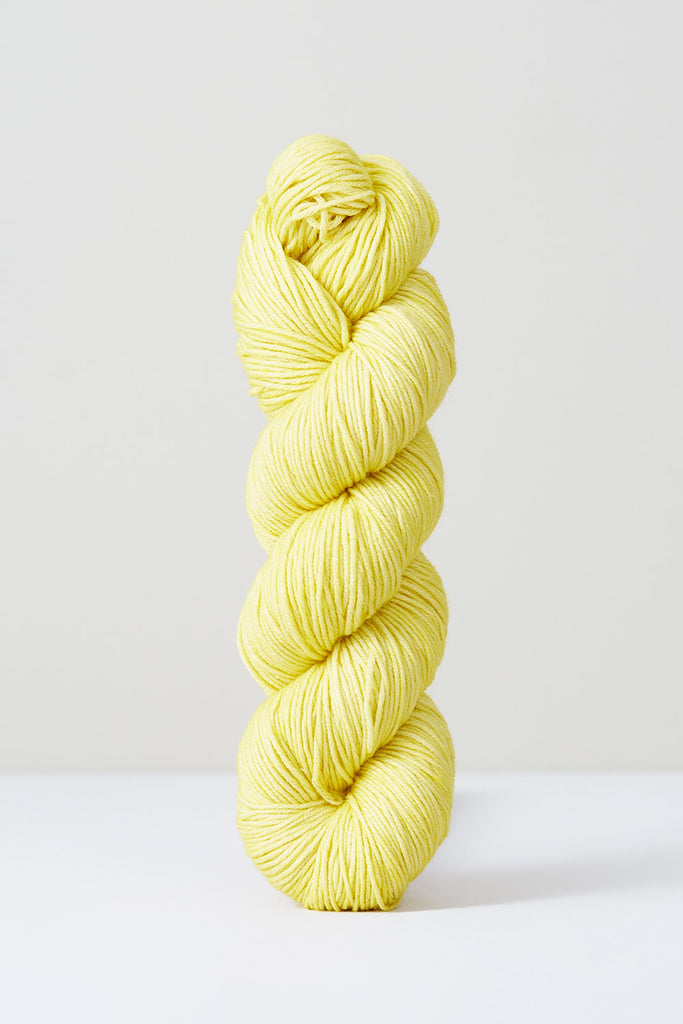 Color Citrus, hand-dyed skein of yarn, in a pale yellow naturally dyed with Citrus.