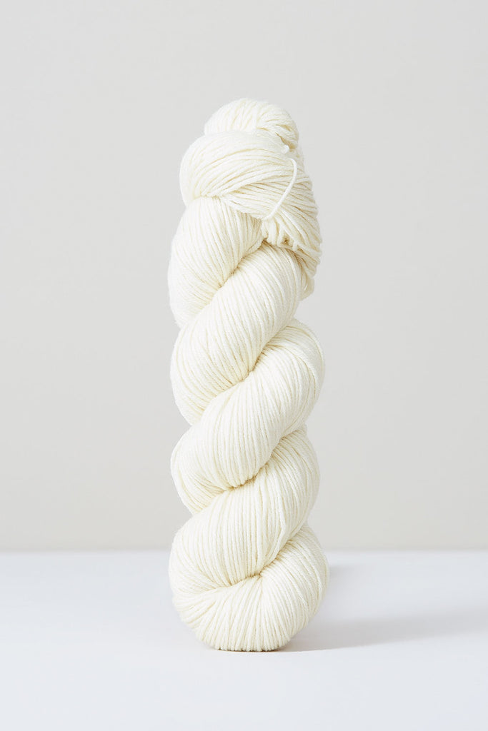 Color Ecru, hand-dyed skein of yarn, in a creamy, natural white.