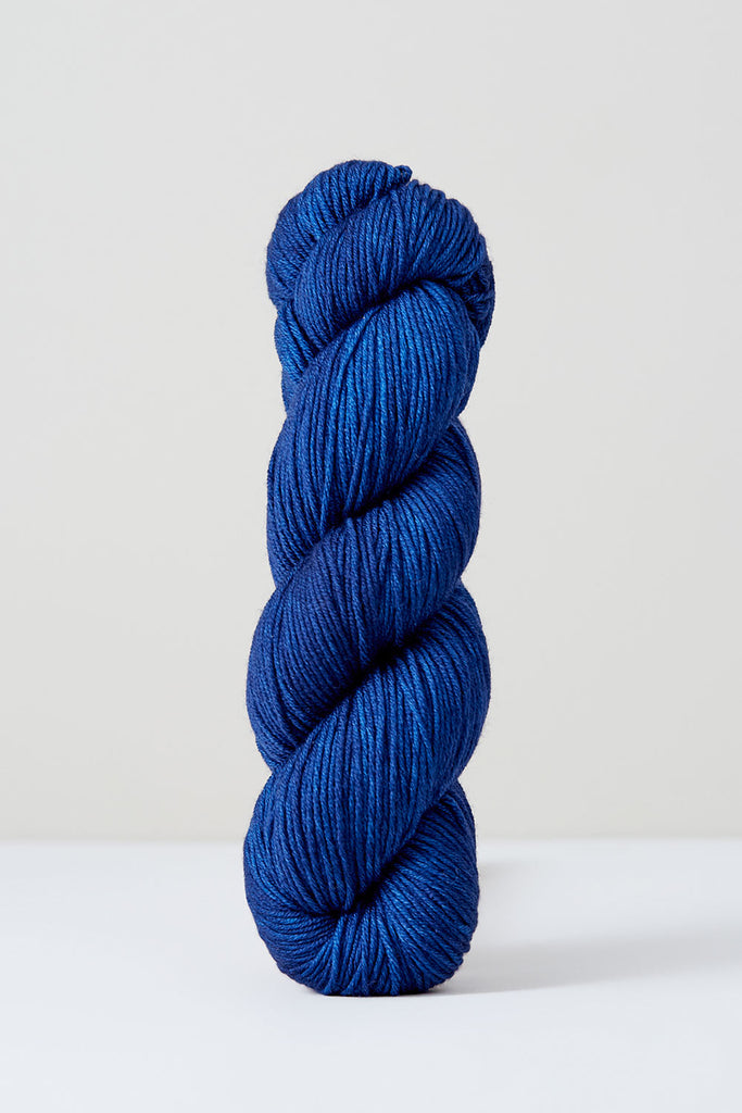 Color Indigo, hand-dyed skein of yarn, in a denim blue naturally dyed with indigo.