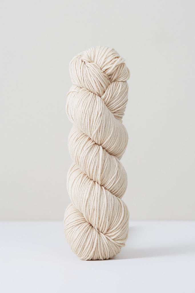 Color Oleaster, hand-dyed skein of yarn, in a light cream naturally dyed with oleaster.