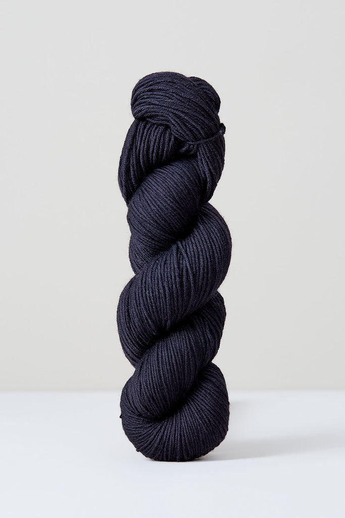 Color Thuja, hand-dyed skein of yarn, in a black naturally dyed with thuja.