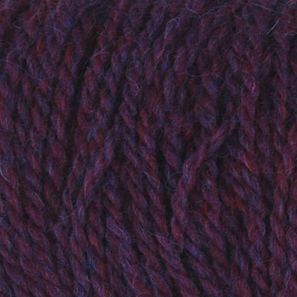 Color: Bilberry 006. A deep purple, heathered variant of Jody Long Andeamo Lite Yarn