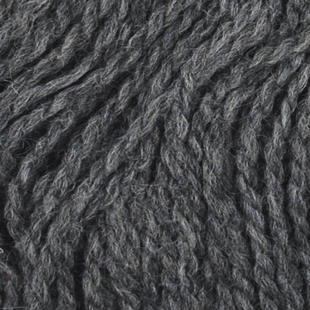 Color: Granite 003. A dark grey colored variant of Jody Long Andeamo Lite Yarn