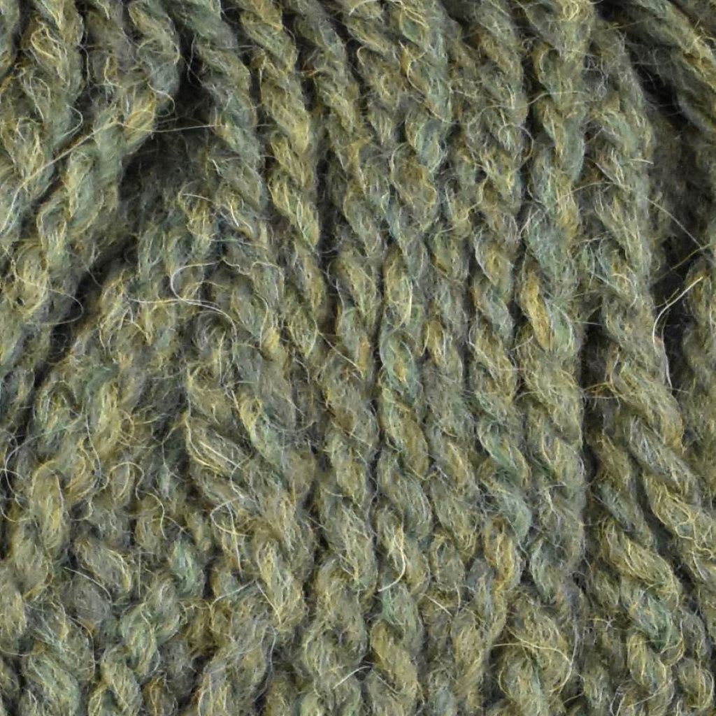 Color: Spinach 015 . A cream colored variant of Jody Long Andeamo Lite Yarn