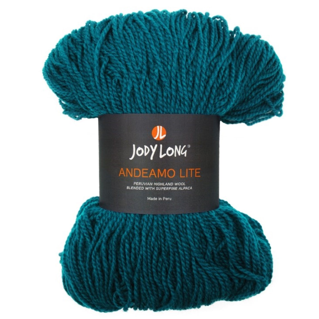 A deep teal skein of Jody Long Andeamo Lite yarn