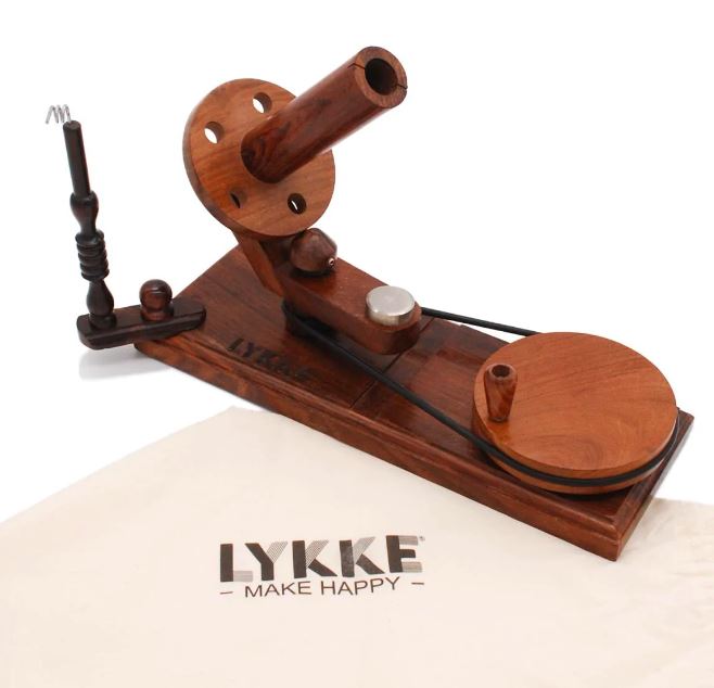 Front view of a Rosewood Lykke Wooden yarn ball winder