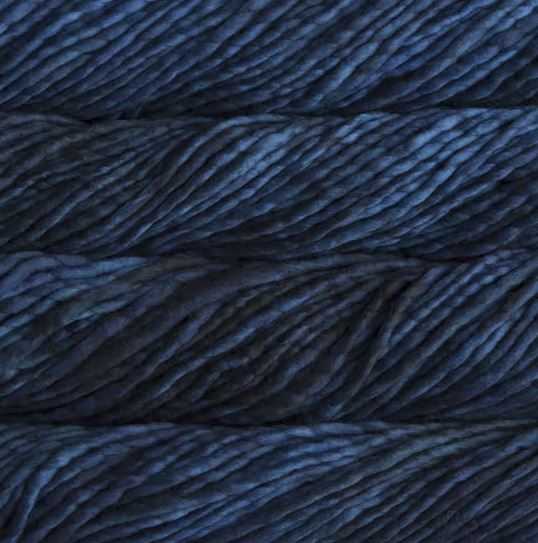 Color: Azul Profundo 150. A dark blue variegated variant of Malabrigo Rasta yarn. 
