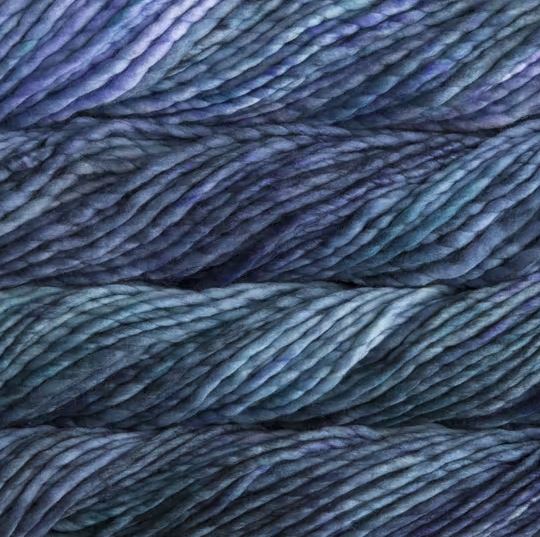 Color: Azules 856. A blue and purple variegated variant of Malabrigo Rasta yarn. 