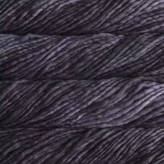 Color: Pearl Ten 069. A deep grey variegated variant of Malabrigo Rasta yarn. 