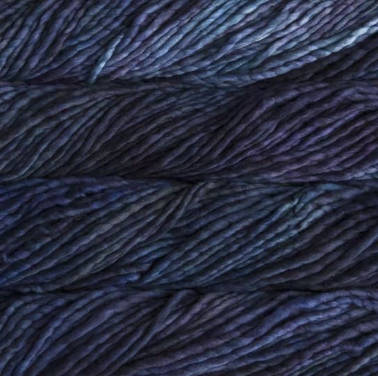Color: Sheri 883. A dark blue variegated variant of Malabrigo Rasta yarn. 