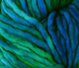 Color: Solis 809. A bright blue and green variegated variant of Malabrigo Rasta yarn. 