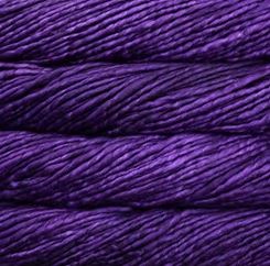 Color: Violeta Africana 808. A dark, royal purple variegated variant of Malabrigo Rasta yarn. 