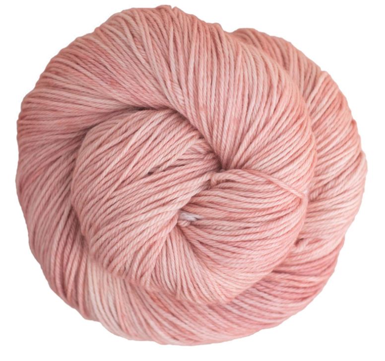 Color: Neverland 341 . A rose pink variegated skein of Malabrigo Ultimate Sock yarn