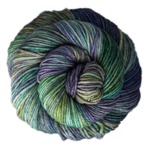 A skein of Caprino in the color Matisse Blue 415, a variegated green, purple, and blue colorway.