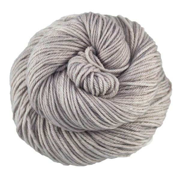 A skein of Caprino in the color Pearl 036, a tonal light grey colorway.