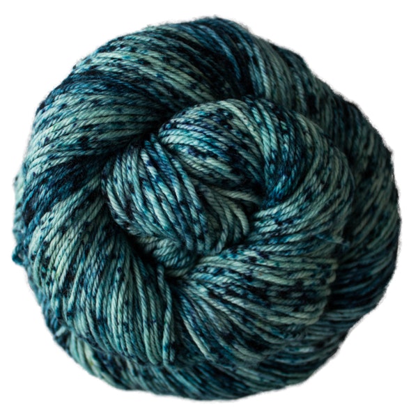 A skein of Caprino in the color Poipu 682, a speckled blue colorway.