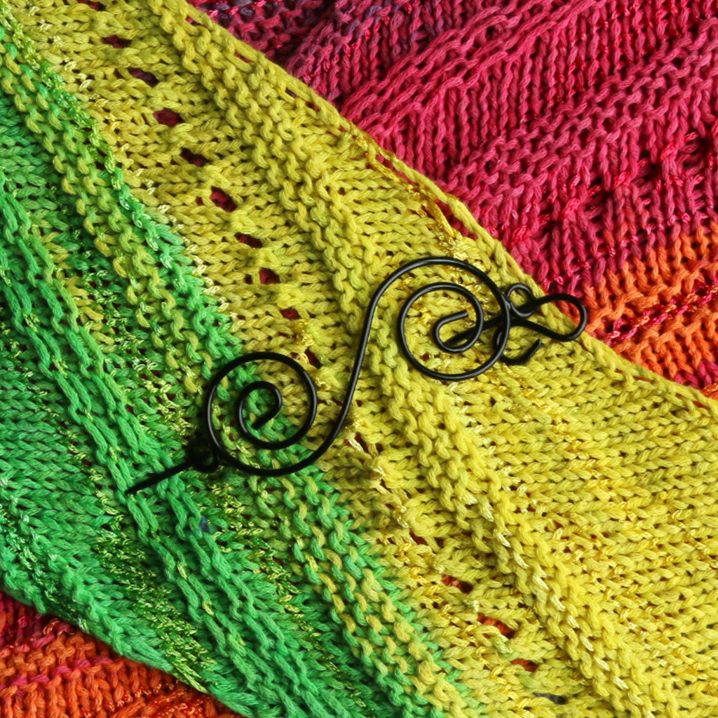 Nirvana's Black Swirl Shawl Pin in the May I Borrow This Shawl knit with Bloom 1010.54