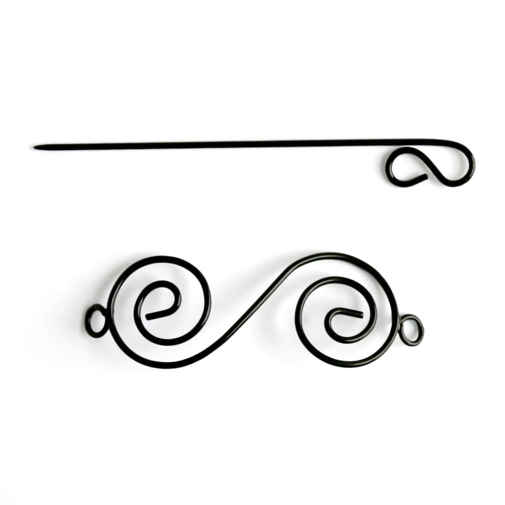 The Nirvana Black Swirl Shawl Pin unfastened, showing the 2 separate pieces.