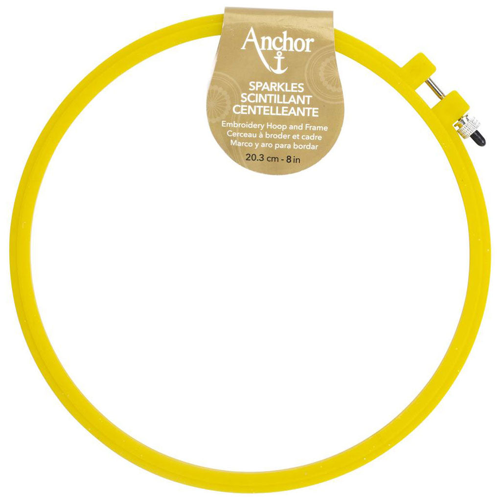 A yellow sparkly 8" plastic embroidery hoop.