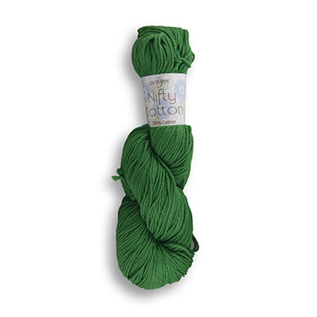 A skein of Cascade's Nifty Cotton, a solid colored aran weight yarn.