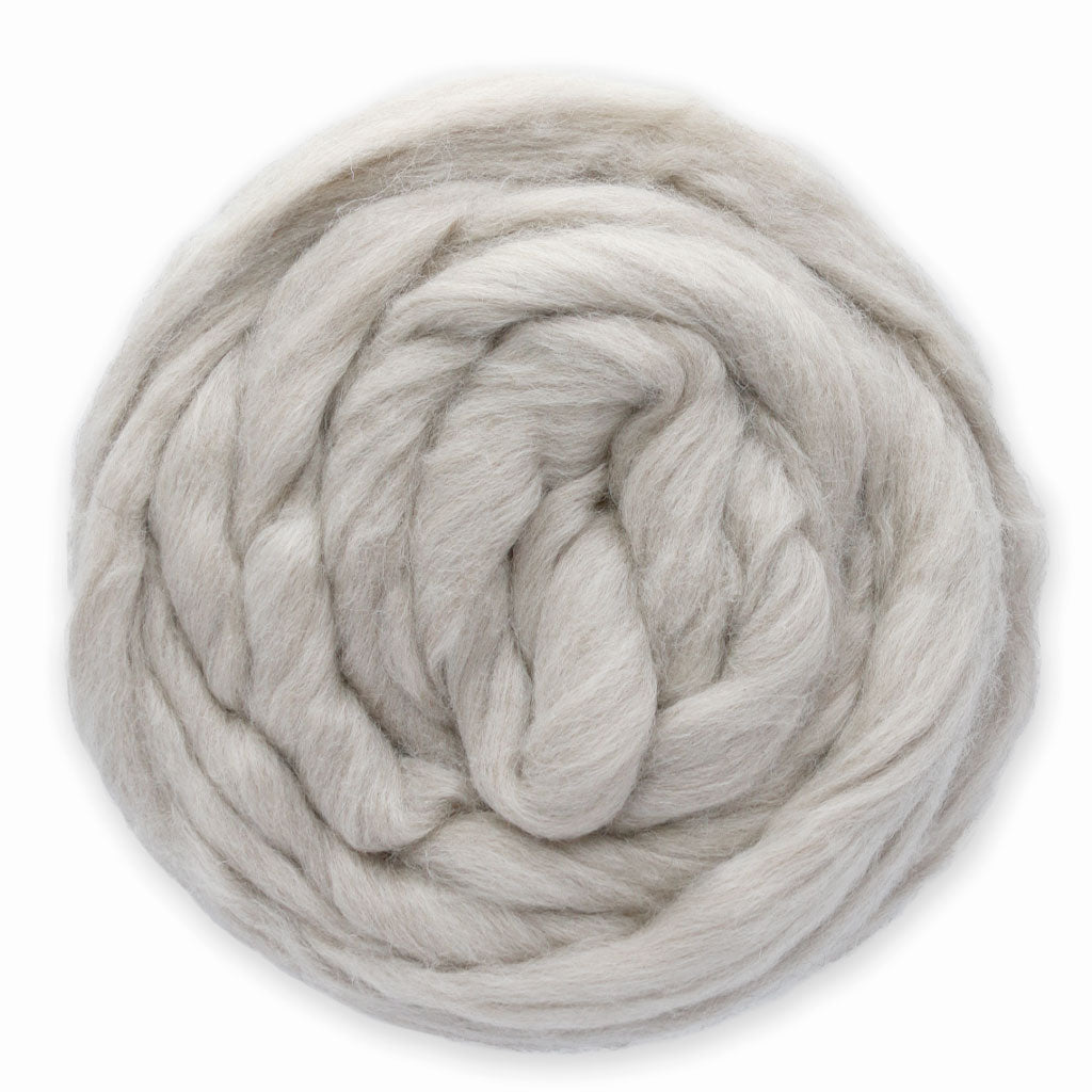 A coil of the undyed Downy Downpour roving
