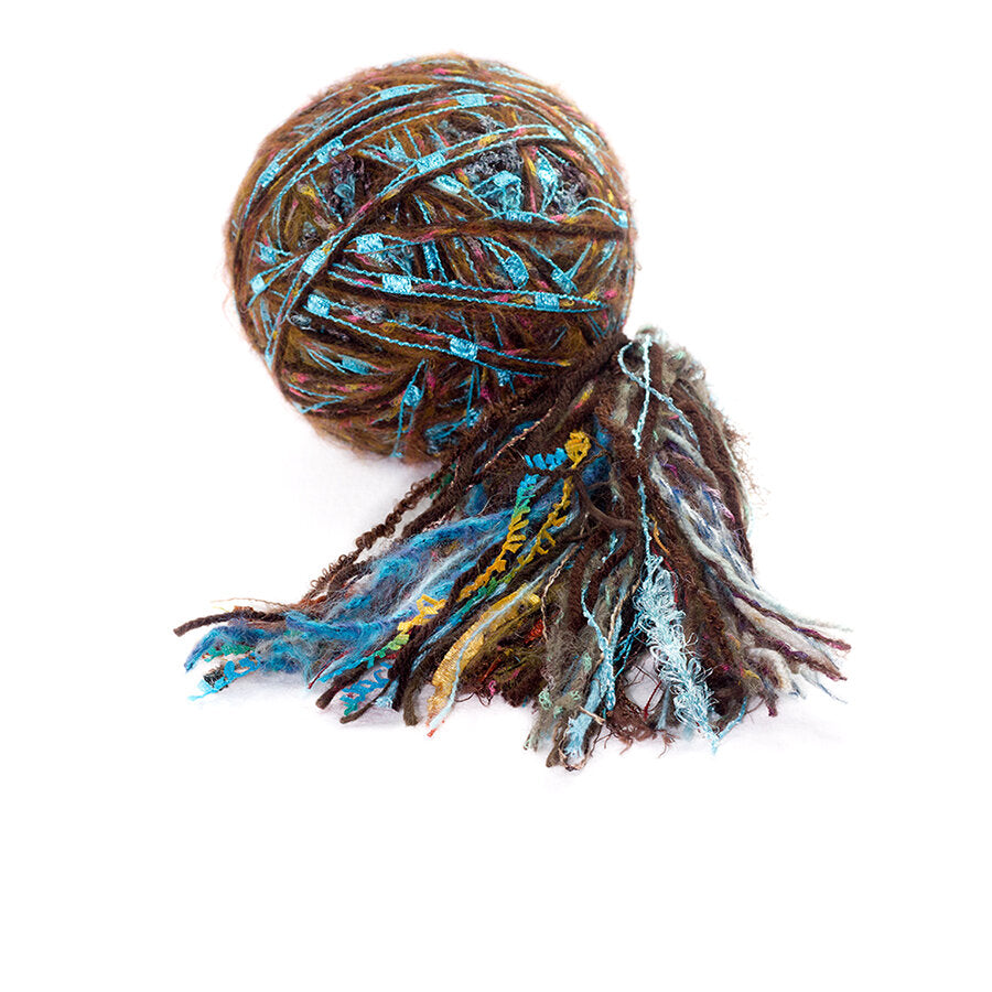 Color #22: a hand wound ball of yarn, mostly brown & blue with a little yellow, pink, & green.